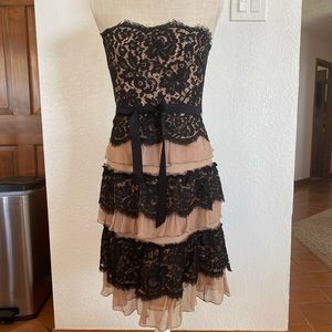 BCBG Strapless dress, size 3, cream/tan color with black lace, ruffles